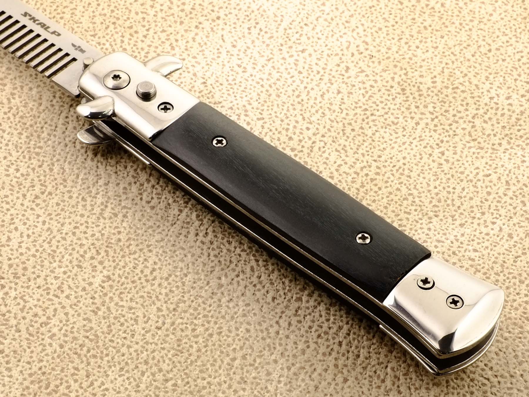 Нож тренировочный выкидной с клинком расческой Ножемир SKALP ABR-1