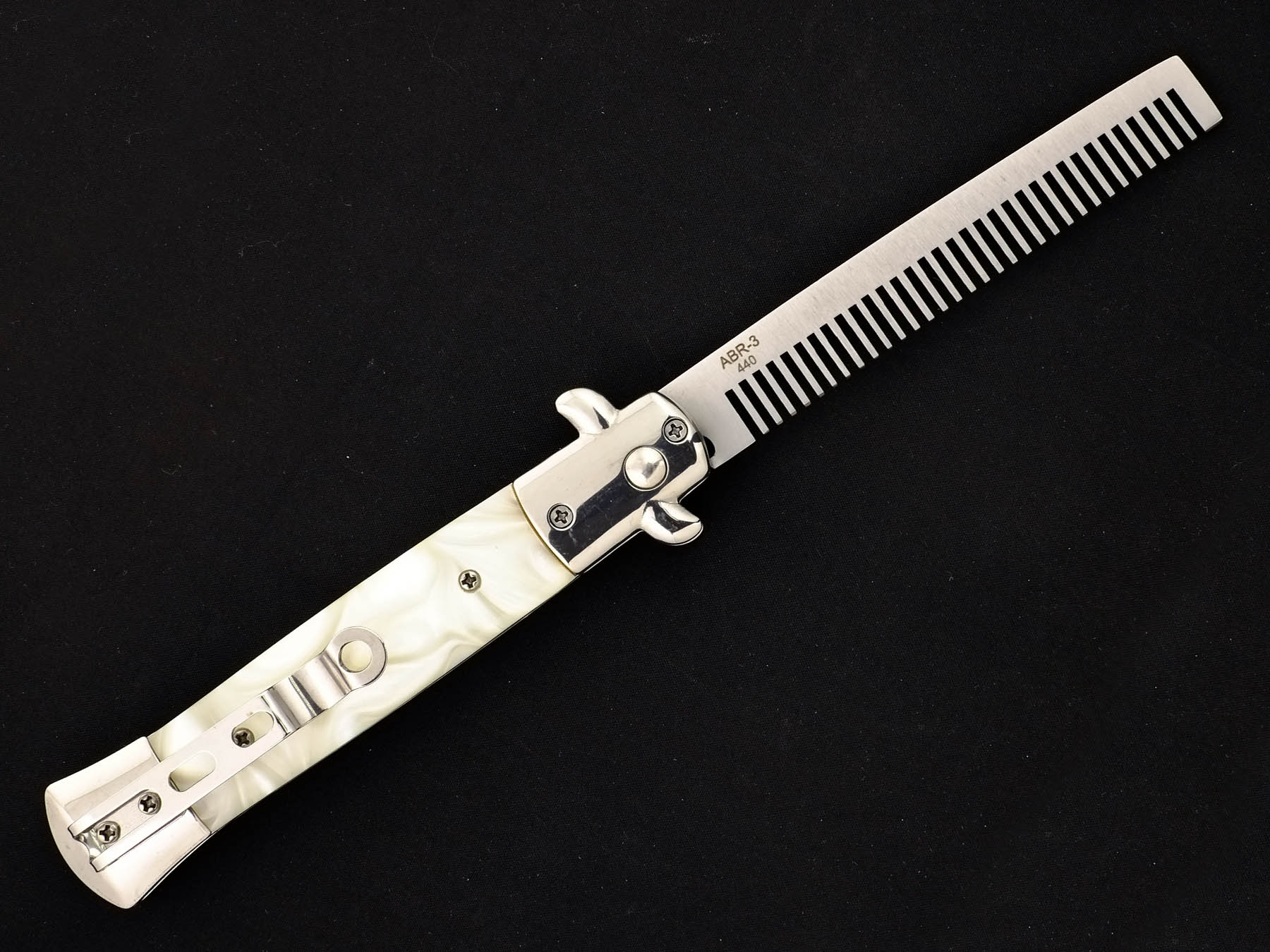 Нож тренировочный выкидной с клинком расческой Ножемир SKALP ABR-3