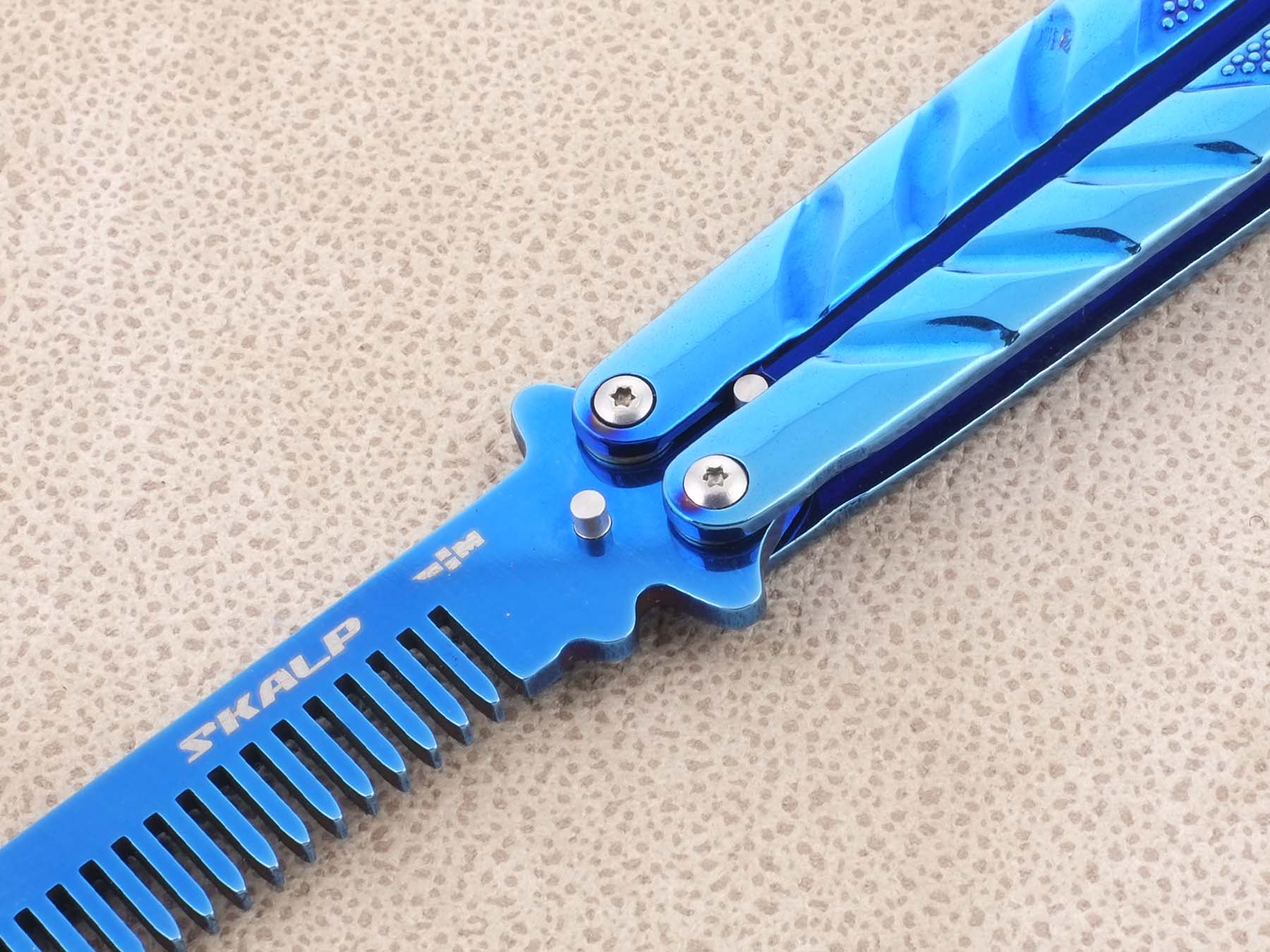 Нож тренировочный большая бабочка с клинком расческой Ножемир SKALP синий титан BRA-23